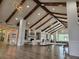 Bright lounge area with vaulted ceiling, exposed beams, decorative lighting, and inviting seating at 559 Eastern Isle Ave, Summerville, SC 29486
