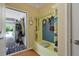 Functional mudroom with built-in storage, bench seating, and easy access to the garage at 559 Eastern Isle Ave, Summerville, SC 29486