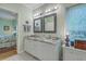 Bathroom view of the double vanity and mirror with marble countertop at 5950 Lowell Reed Rd, Ravenel, SC 29470