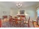 Elegant dining room with hardwood floor, chandelier, and classic furniture at 5950 Lowell Reed Rd, Ravenel, SC 29470