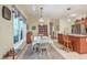 Eat-in kitchen with hardwood floors and lots of natural light at 5950 Lowell Reed Rd, Ravenel, SC 29470