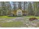 On property, large shed offers space for lawn equipment and other outdoor equipment at 5950 Lowell Reed Rd, Ravenel, SC 29470
