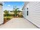 Relax on this spacious concrete patio in a fenced yard with a door to access the house at 607 Heartwood Ln, Summerville, SC 29486