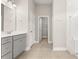 Bathroom featuring a gray vanity with white quartz countertop and tiled flooring at 607 Heartwood Ln, Summerville, SC 29486