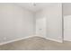 Neutral bedroom features plush carpet and a double door closet at 607 Heartwood Ln, Summerville, SC 29486