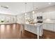 Open-concept kitchen seamlessly flows into the living area, creating an ideal space for modern living and entertaining at 607 Heartwood Ln, Summerville, SC 29486