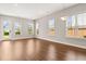 Bright living room with hardwood floors, neutral paint, and lots of natural light at 607 Heartwood Ln, Summerville, SC 29486