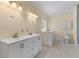 Bathroom featuring double sinks, soaking tub, tiled floors, and neutral wall color at 643 Backfield Rd, Walterboro, SC 29488