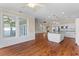 Open-concept living area shows kitchen and living room, as well as stairs to the second floor at 643 Backfield Rd, Walterboro, SC 29488