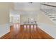 Spacious living room with rich hardwood floors, soaring ceilings and multiple french doors at 643 Backfield Rd, Walterboro, SC 29488
