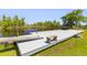 View of the private pier, perfect for relaxation and water activities on the serene river at 643 Backfield Rd, Walterboro, SC 29488