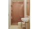 Chic bathroom with a glass shower, a uniquely shaped sink, and pink tile at 8 Homel Pl, Charleston, SC 29403