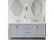 Elegant bathroom vanity with double sinks, gold fixtures, and ornate mirrors adds luxury at 8 Homel Pl, Charleston, SC 29403