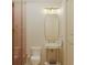 Stylish bathroom featuring a sleek sink, standing shower, and minimalist lighting at 8 Homel Pl, Charleston, SC 29403