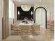 Elegant dining room featuring a chandelier, neutral chairs, and a stylish buffet at 8 Homel Pl, Charleston, SC 29403