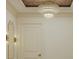 Chic hallway featuring modern light fixtures, decorative mirror, and elegant chandelier at 8 Homel Pl, Charleston, SC 29403