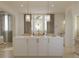 Large kitchen island with white marble counters and gold hardware accents at 8 Homel Pl, Charleston, SC 29403