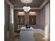Cozy office space with decorative art and a modern chandelier at 8 Homel Pl, Charleston, SC 29403