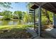 Beautiful view of the lake from the house with a spiral staircase visible at 8483 Yadkin Cir # C, North Charleston, SC 29418