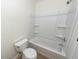 Clean bathroom featuring a bathtub, shower, and storage shelves at 8483 Yadkin Cir # C, North Charleston, SC 29418