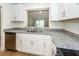 Updated kitchen with white cabinets, granite counters and stainless steel appliances at 8483 Yadkin Cir # C, North Charleston, SC 29418
