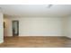 Spacious living room with light hardwood floors, white walls and trim at 8483 Yadkin Cir # C, North Charleston, SC 29418