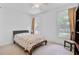 Bright bedroom with natural light and neutral carpeting at 8781 Laurel Grove Ln, North Charleston, SC 29420