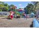 Community playground with colorful slides and play structures providing a fun outdoor space for children at 8781 Laurel Grove Ln, North Charleston, SC 29420