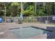 Shallow pool with chairs and tables, perfect for relaxation and enjoyment at 8781 Laurel Grove Ln, North Charleston, SC 29420