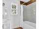 Updated bathroom boasts a new vanity, tub, and modern tile surround at 905 Simmons St, Mount Pleasant, SC 29464