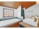 Large bathroom with a soaking tub, shower, and double sinks at 905 Simmons St, Mount Pleasant, SC 29464