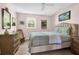Cozy bedroom featuring a bed, dresser, and a bright window at 905 Simmons St, Mount Pleasant, SC 29464