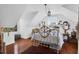 Charming bedroom featuring natural light, hardwood floors, and cozy decor at 905 Simmons St, Mount Pleasant, SC 29464