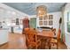 Inviting dining room with hardwood floors, vintage decor, and ample seating at 905 Simmons St, Mount Pleasant, SC 29464