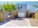 View of detached garage, gate, and staircase on a sunny day at 905 Simmons St, Mount Pleasant, SC 29464