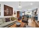 Comfortable living room featuring stylish decor, hardwood floors, and comfortable seating arrangements at 905 Simmons St, Mount Pleasant, SC 29464