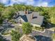 Aerial view of clubhouse shows well-maintained building with surrounding trees and parking at 9146 Spring Branch Ct, North Charleston, SC 29406