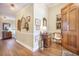 Spacious foyer entrance with hardwood flooring and traditional design elements creating a welcoming ambiance at 9146 Spring Branch Ct, North Charleston, SC 29406
