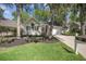 Charming single-story home with well-manicured lawn, classic design, and inviting curb appeal at 9146 Spring Branch Ct, North Charleston, SC 29406