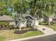 Beautiful home with a well-maintained lawn, driveway, and light siding in a peaceful community at 9146 Spring Branch Ct, North Charleston, SC 29406