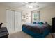 Comfortable bedroom featuring a ceiling fan and plush bedding at 9660 Godwin St, Ladson, SC 29456