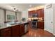 Modern kitchen with stainless steel appliances, granite countertops, and stylish cabinetry at 9660 Godwin St, Ladson, SC 29456
