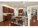 Open kitchen with granite counters, stainless appliances, and a central island with seating at 9660 Godwin St, Ladson, SC 29456