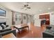 Spacious living room featuring a fireplace and open access to the kitchen at 9660 Godwin St, Ladson, SC 29456