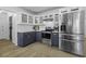 Modern kitchen with stainless steel appliances, sleek countertops, and ample cabinet space at 99 Shadowmoss Pkwy, Charleston, SC 29414