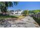 Spacious backyard with a wooden fence, patio, and ample space for outdoor activities and gardening at 101 N Warwick Trce, Goose Creek, SC 29445
