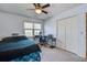 Cozy bedroom with carpet features two double hung windows, closet and an office desk at 101 N Warwick Trce, Goose Creek, SC 29445