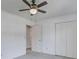 Simple bedroom features neutral carpet, a ceiling fan, and closet at 101 N Warwick Trce, Goose Creek, SC 29445
