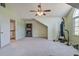 Large bonus room with carpet, natural light, and tall ceilings offers flexible living space at 101 N Warwick Trce, Goose Creek, SC 29445