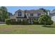 Charming two-story home with mature trees and landscaped yard at 101 N Warwick Trce, Goose Creek, SC 29445